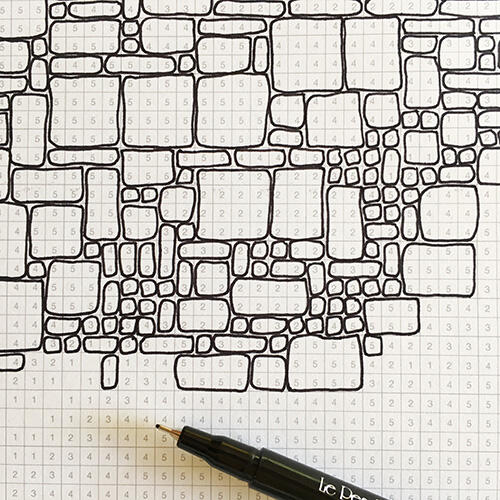 close-up of drawing of just a bunch of rounded-corners rectangles on a grid background